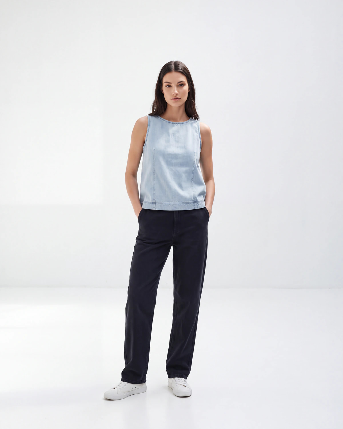 A denim top shown on a model, generated by Nokkh from the flat product photo